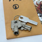 NOS Genuine HARLEY DAVIDSON BARREL KEY OEM CODE 3979 71452-91A