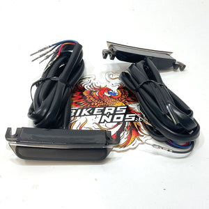 Harley 2014-2023 Touring Saddlebag Spoiler Smoked Lens Red Light Kit 90200736